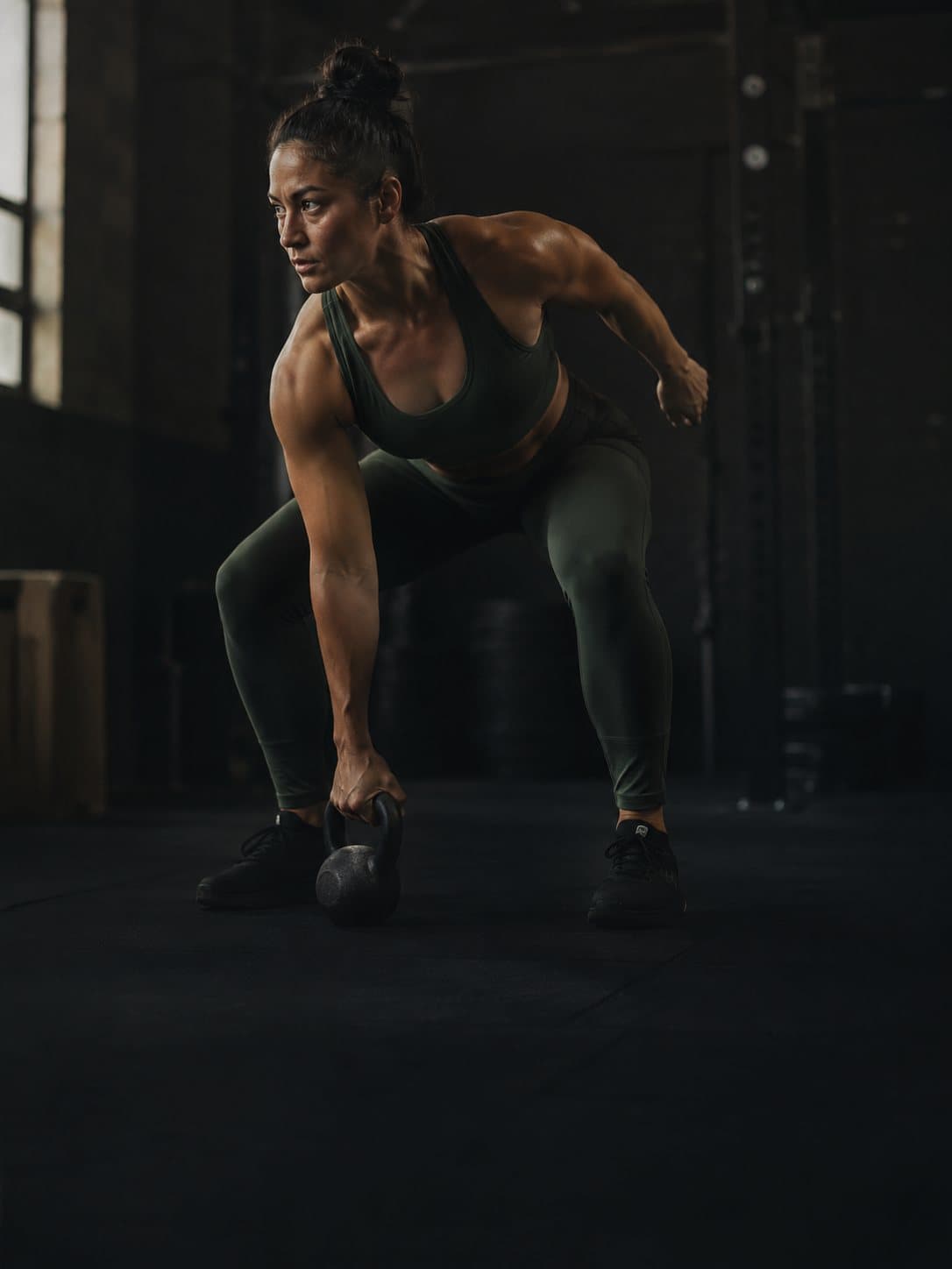 Athlete training with kettlebell